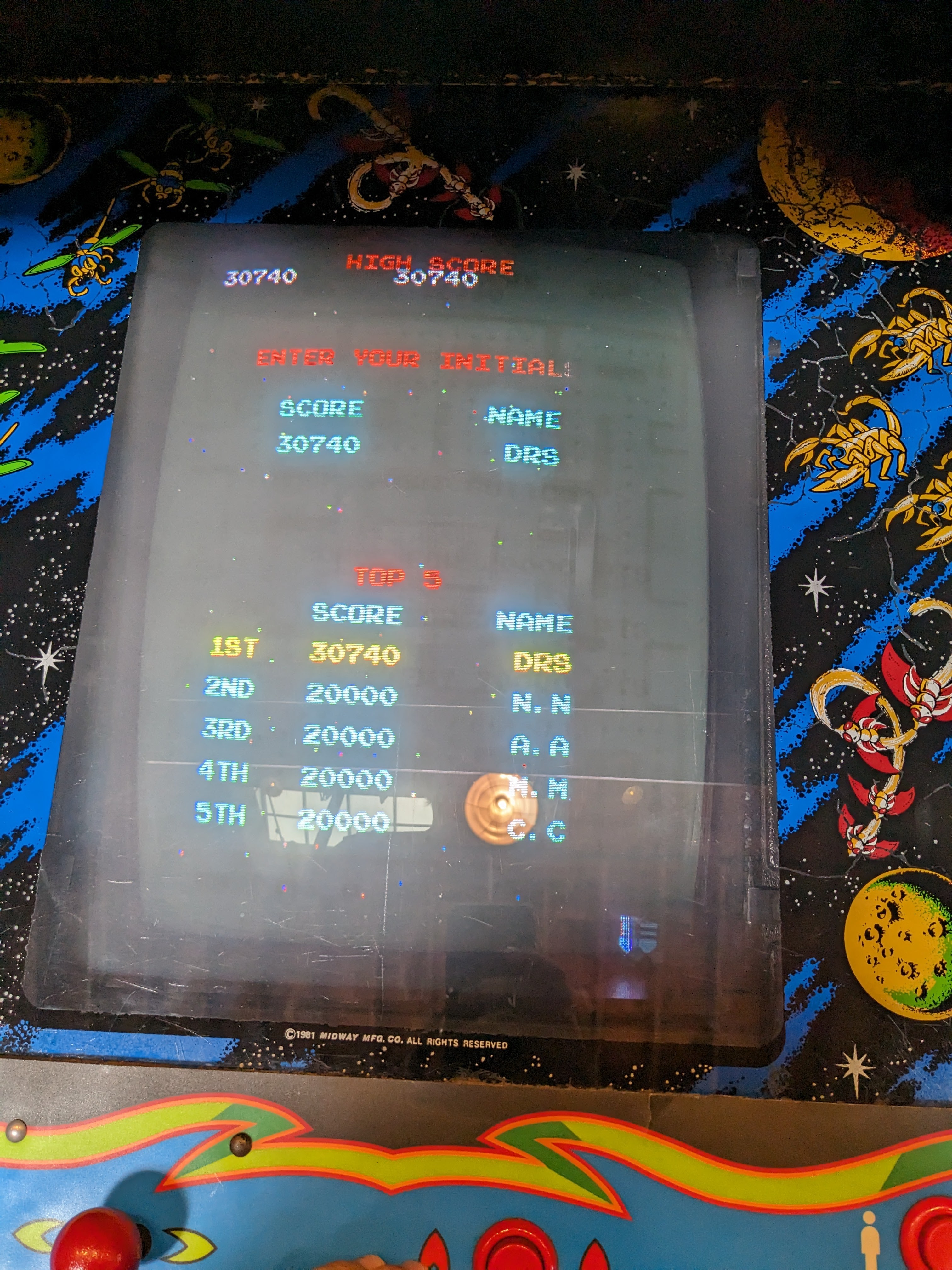 Me getting a (pretty low) high score on Galaga at an arcade